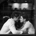 Romantic Couple in Black and White Café Setting